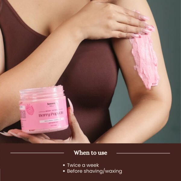 Model applying Berry Popsicle fruit body scrub
