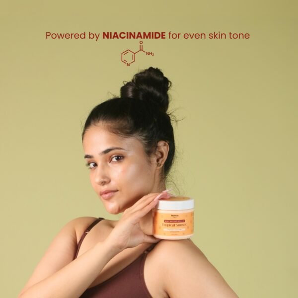 girl holding tropical body butter