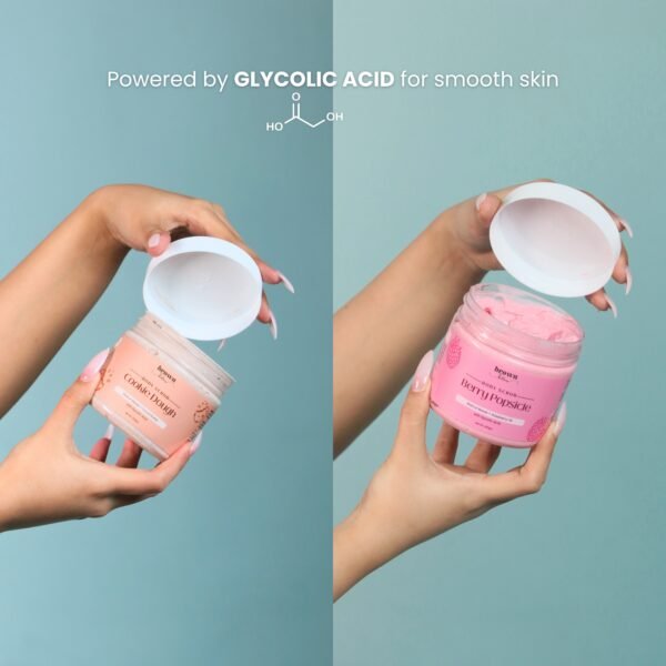 girl holding body butter and body scrub open jar