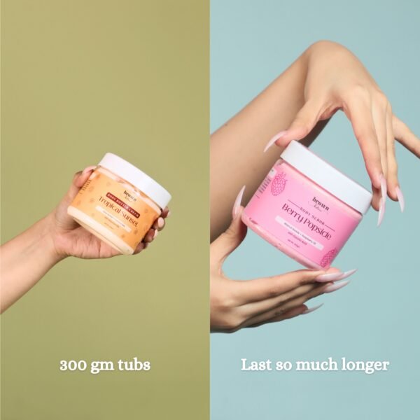 girl holding tropical body butter & berry body scrub