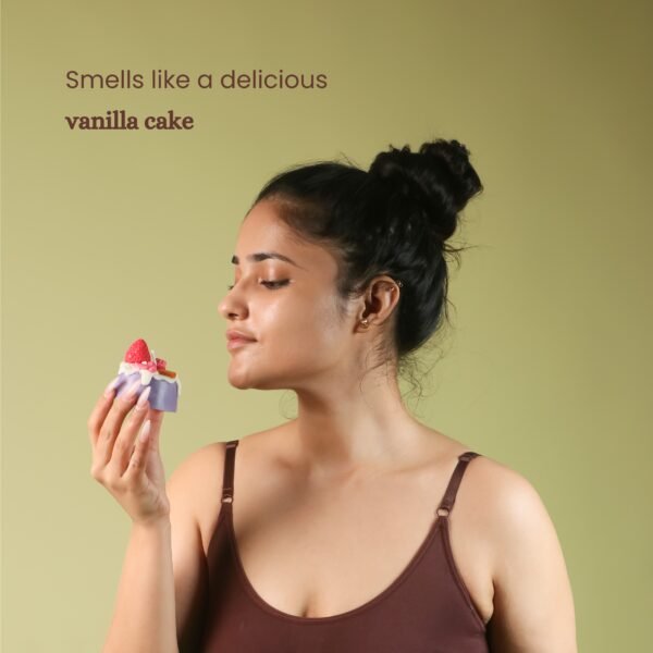 Girl smelling candle